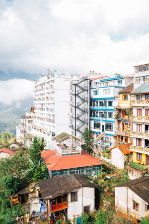 Hotel buildings and mountain with cloud in Sapa, Vietnamのeditorial素材