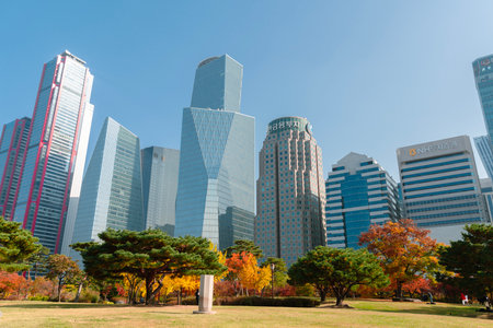 Seoul, Korea - November 5, 2021 : Yeouido park autumn leaves and skyscrapersのeditorial素材