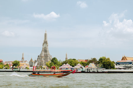 Bangkok, Thailand - June 29, 2023 : Wat Arun temple and Chao Phraya Riverのeditorial素材