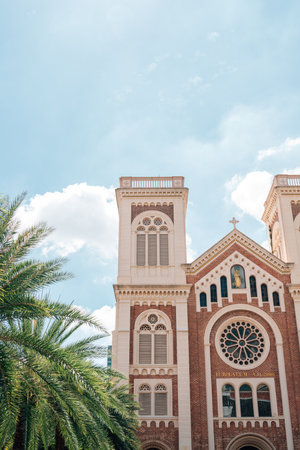 Assumption Cathedral with palm tree in Bangkok, Thailandのeditorial素材