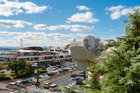 Yamaguchi, Japan - December 2, 2023: Shimonoseki Kamon Wharf shopping mall and Kameyama Hachimangu Shrine Torii gateのeditorial素材