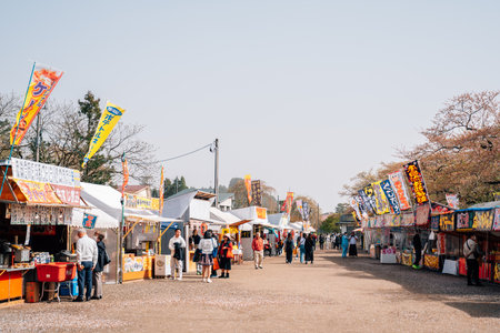 Akita, Japan - April 21, 2023: Kakunodate street cherry blossom festival food stallのeditorial素材