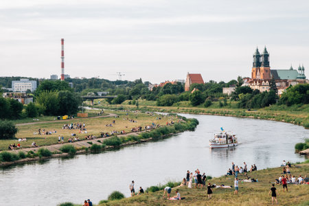 Poznan, Poland - June 9, 2019 : View of Warta river park and crowd of peopleのeditorial素材
