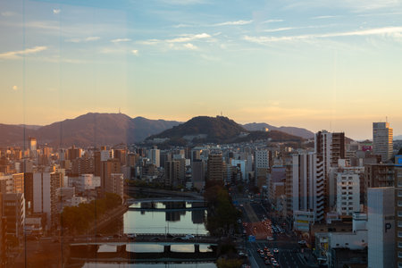 Hiroshima, Japan - December 4, 2023 : Hiroshima city downtown urban panoramic view at sunsetのeditorial素材