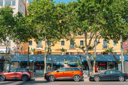 Barcelona, Spain - June 29, 2025: Barceloneta beach street restaurantのeditorial素材
