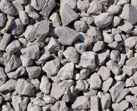 Grey stones captured in sunlight making beautiful backgroundの写真素材