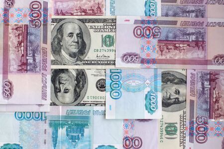 Background of russian and american bank notesの写真素材
