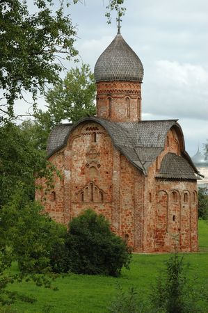 Ancient church among the trees in Russiaの写真素材