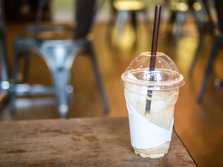 Empty cold coffee drinking cup show idea of long time waitingの写真素材