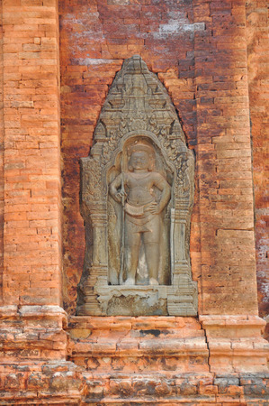 Ancient stone carving in Lolei Temple in Cambodiaの写真素材