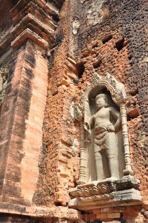 The guardian of ruined Preah Ko Wat in Roulos, Siem Reap, Cambodia. Small Hindu temple located. It is dedicated to Lord Shiva and used to hold a golden image of him.の写真素材
