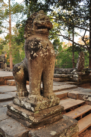 Stone guardian lion at Banteay Kdei Temple in Angkor, Cambodiaの写真素材