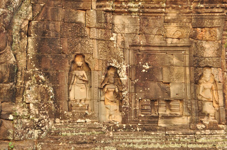 Beautiful apsaras at Banteay Kdei Temple in Angkor, Cambodiaの写真素材