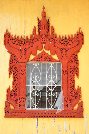 Beautiful window of Kyaik Hwaw Wun Pagoda in Thanlyin,Myanmar.の写真素材