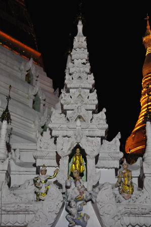Beautiful detail of Shwedagon pagoda in Yangon at night in Myanmar.の写真素材