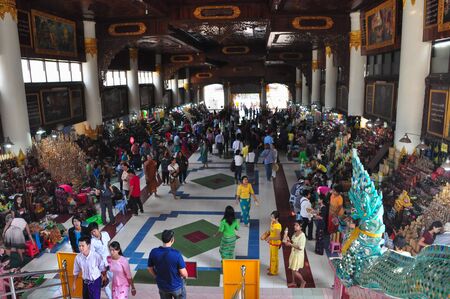 Bago,Myanmar - 28 November 2015: Unknown tourists visit the temple of Shwethalyaung Reclining Buddha in Bago, Myanmar. It is the most famous reclining buddha in Bago, Myanmar.のeditorial素材
