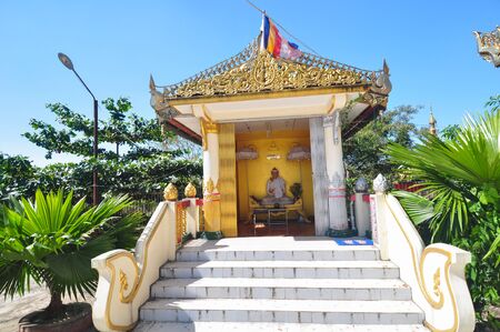 Beautiful detail of the temple of Kyaik Pun Pagoda, Pagoda of four giant Buddha statues in Bago, Myanmar.の写真素材