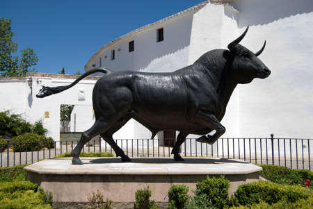 Sculpture of fighting bull in the bullring of Ronda, Malaga, Spainの写真素材