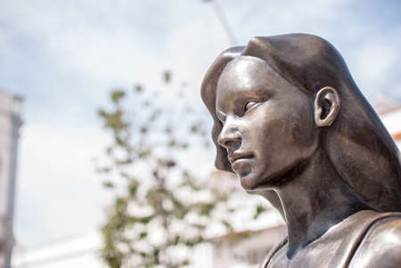metal sculpture beautiful woman face profile in portuguese algarveの写真素材
