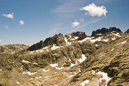 Mountain landscape with peaks ridge and snow in sierra de gredos, avila, spain