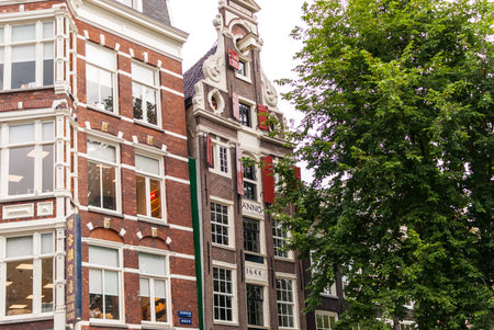 Old houses in Amsterdam. Amsterdam is the capital and most populous city of the Netherlands.の写真素材