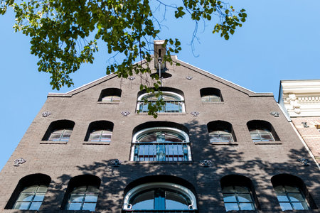 Facade of a residential building in the center of Amsterdam, Netherlandsの写真素材