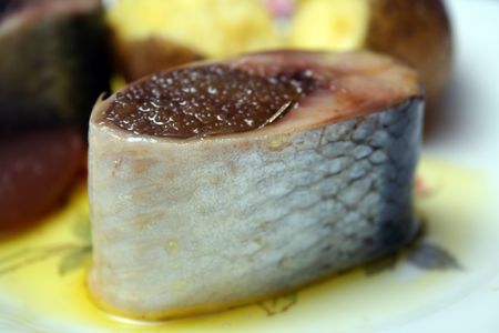 sliced herring with cavair and potato horizontalの写真素材