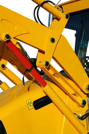 Hydraulic elements of the universal bulldozer of yellow color on a white background, Isolated (look similar images in my portfolio)の写真素材