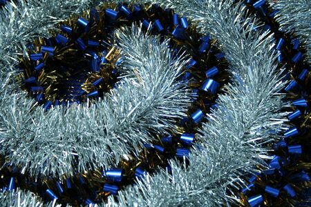 Brilliant New Year's tinsel of dark blue and silvery colorの写真素材