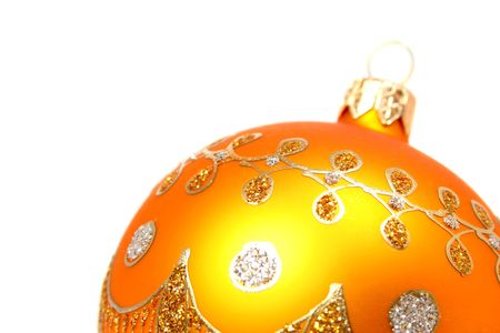 New Year's sphere of yellow color on a white background の写真素材