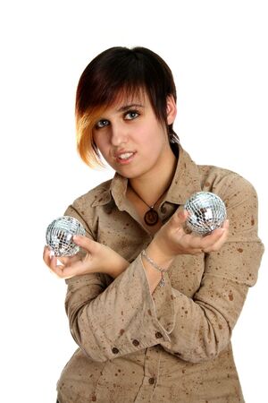 The young girl holds mirror spheres in hands, isolatedの写真素材