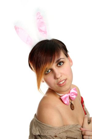 The young bunny girl with the pink tie-butterfly and rabbit ears, isolatedの写真素材