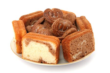 Slices of a chocolate cake on a white background の写真素材