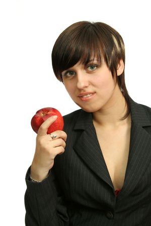 Friendly businesswoman with red apple, isolated on whiteの写真素材