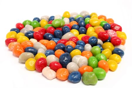 Heart made of multi-coloured sweets with raisin 2, isolated on white, (look similar images in my portfolio)の写真素材