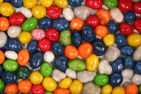 Horizontal background made of multi-coloured sweets with raisin 2, (look similar images in my portfolio)の写真素材