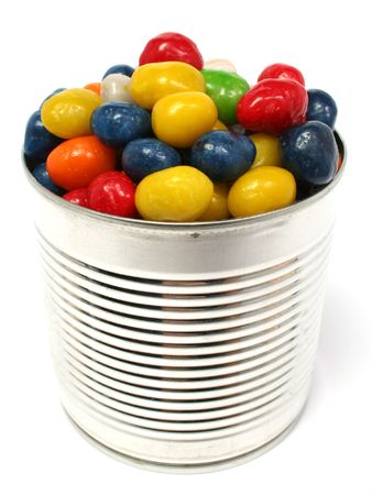 Multi-coloured sweets with raisin in metal bank, isolated on white, (look similar images in my portfolio)の写真素材
