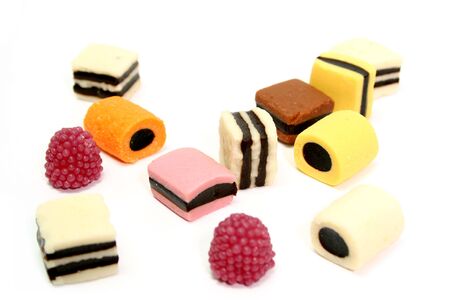 Fruit sweets in the form of various color rolls 3, isolated on white, (look similar images in my portfolio)の写真素材