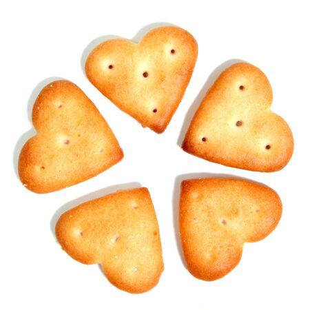Salty cookies in the form of a flower 2, isolated on whiteの写真素材
