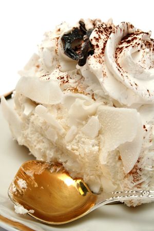 Slice of a pie on plate with the spoon の写真素材