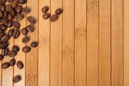 Grains of coffee on a wooden carpet 8の写真素材
