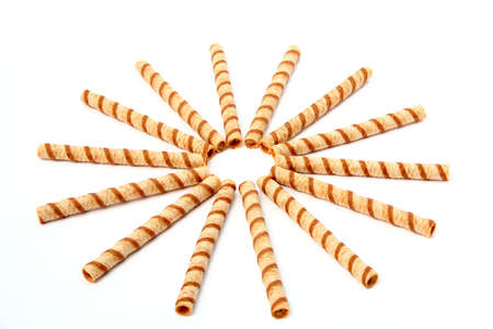 Striped wafer tubules with a chocolate cream, isolated, (look similar images in my portfolio)の写真素材
