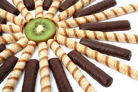 Vanilla chocolate sticks with a cream and sliced kiwi, isolated, (look similar images in my portfolio)の写真素材