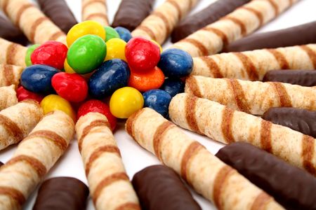 Chocolate sticks with a cream and the multi-coloured sweets, (look similar images in my portfolio)の写真素材