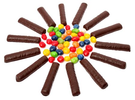 Chocolate sticks with a cream and the multi-coloured sweets isolated, (look similar images in my portfolio)の写真素材