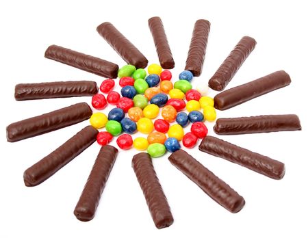 Chocolate sticks with a cream and the multi-coloured sweets isolated, (look similar images in my portfolio)の写真素材
