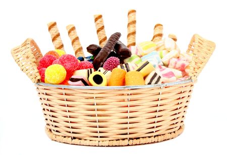 Basket with various sweets and the cookies, isolated, (look similar images in my portfolio)の写真素材