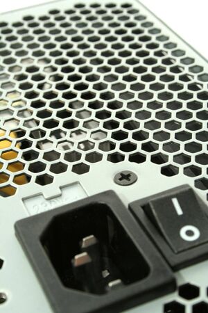 closeup power supply with lattice and switch buttonの写真素材