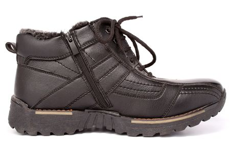 The left man's winter leather boot, the right-side view, isolated on white, (look similar images in my portfolio)の写真素材