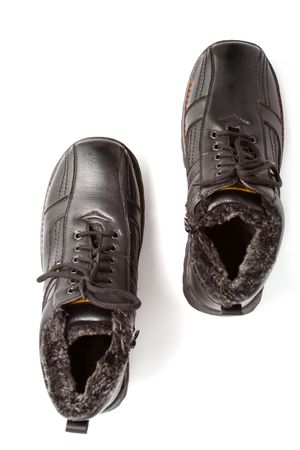 Two man's winter leather boots of darkly brown color on a white background the top view, (look similar images in my portfolio)の写真素材